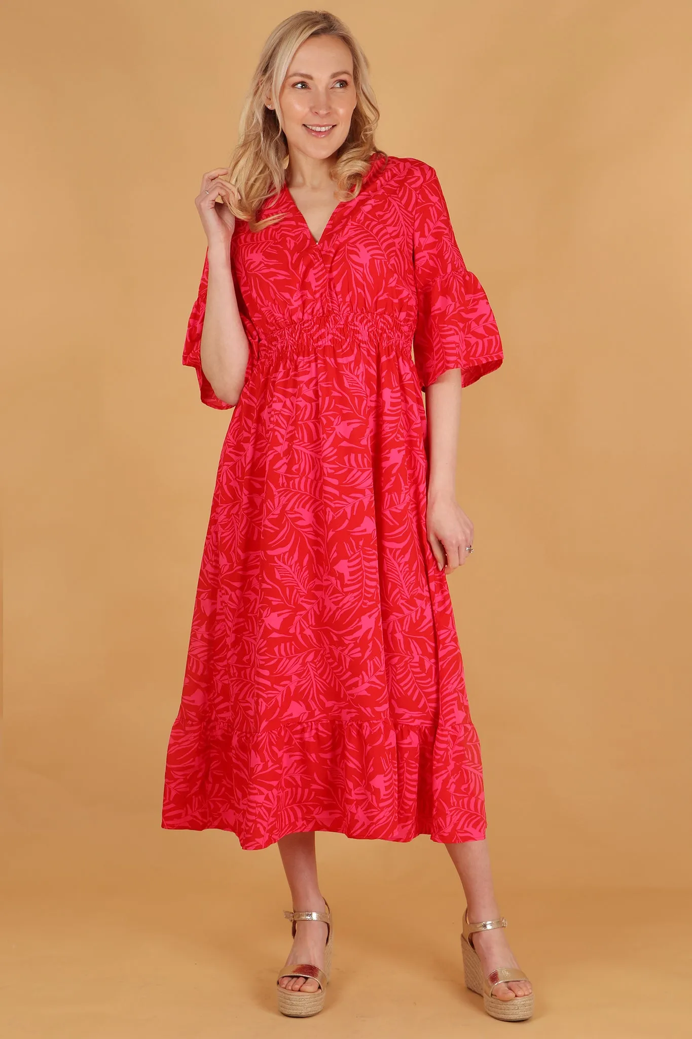 Tropical Leaf Print V-Neck Shirred Maxi Dress with Fluted Sleeves in Red