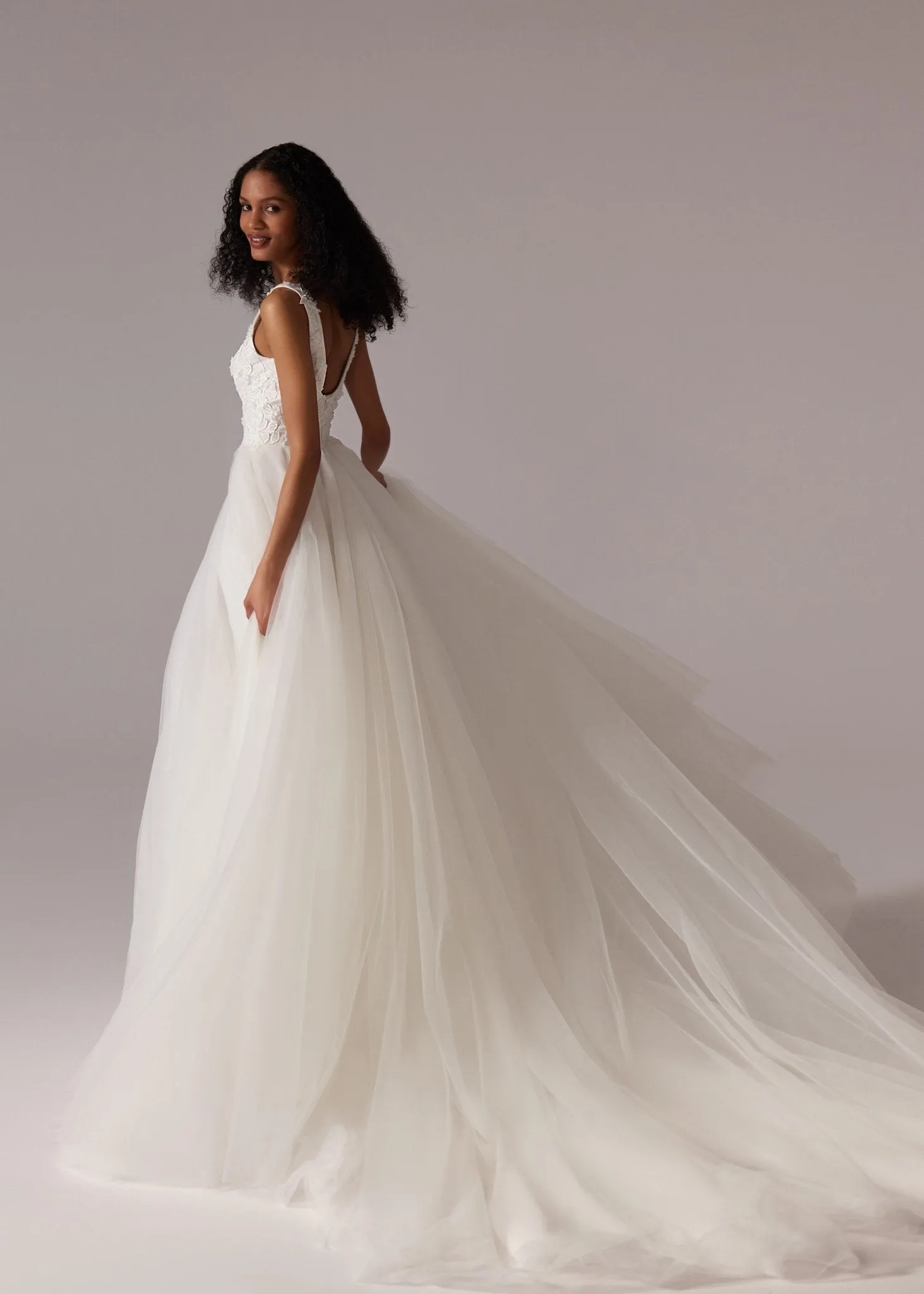 White Plunging V-Neck Wedding Dress with Floral Lace Bodice, High Slit, and Floor-Length Tulle Train - Plus Size